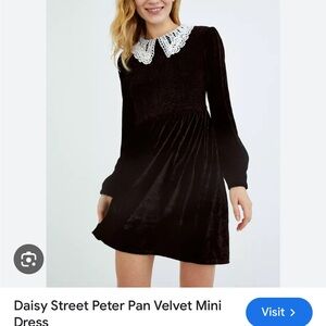 Black velvet mini dress with white lacey peter pan collar